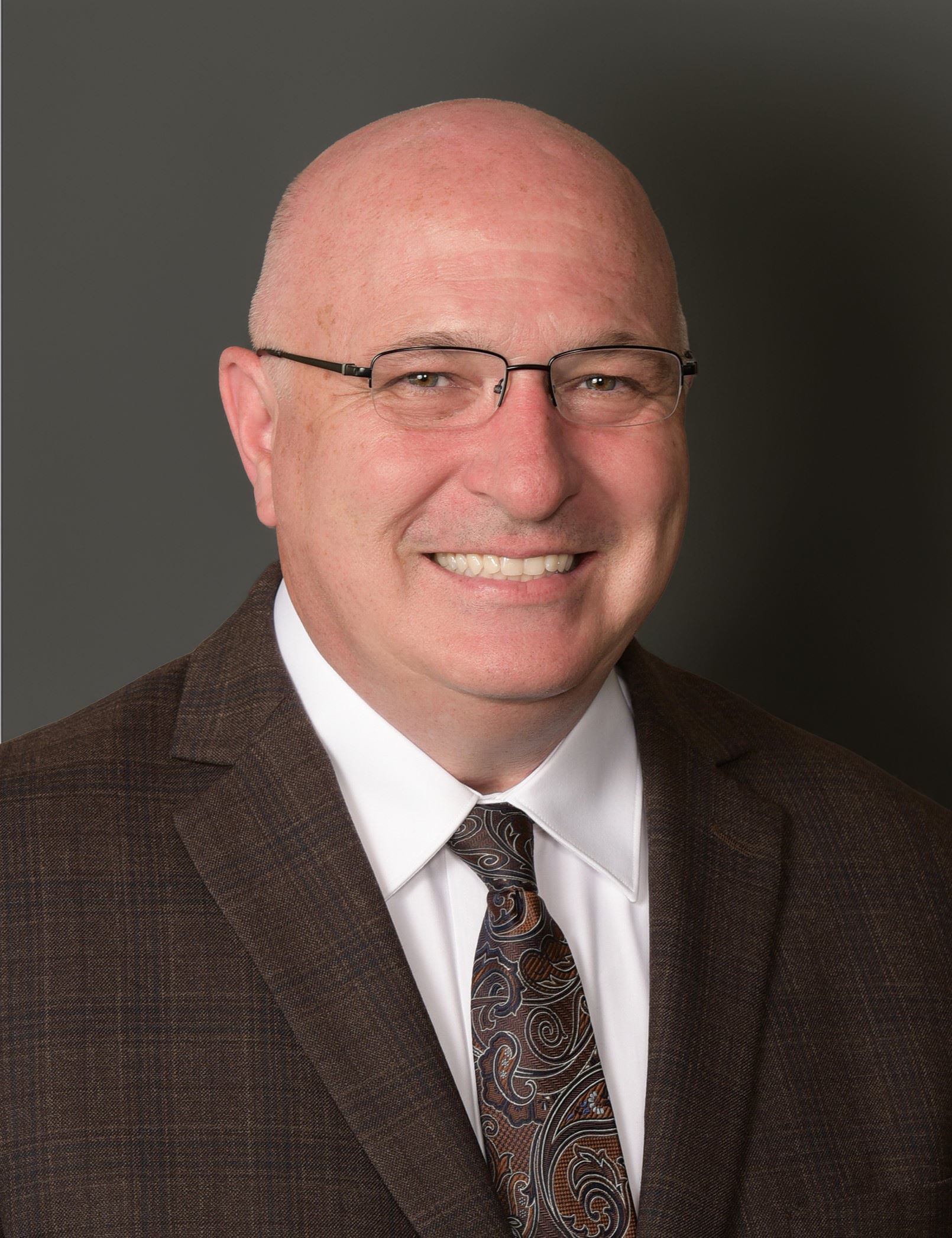 Ned Thomas w Gray background