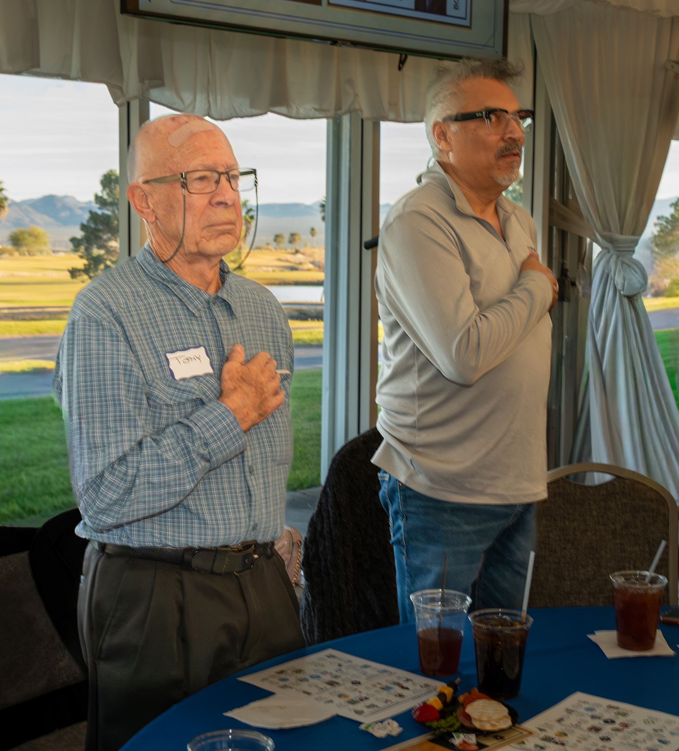 2026 State of the City (87) Photo of two men standing for National Anthem