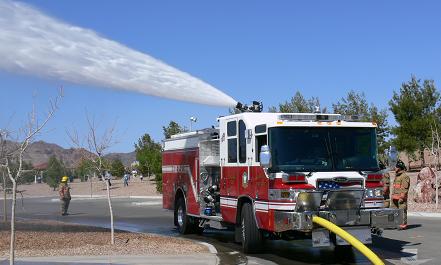 A fire truck spraying water